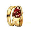 Bold snake shape women’s watch with gold expandable bracelet, red dial, diamond accents, Roman numerals, and glamorous luxury shine design