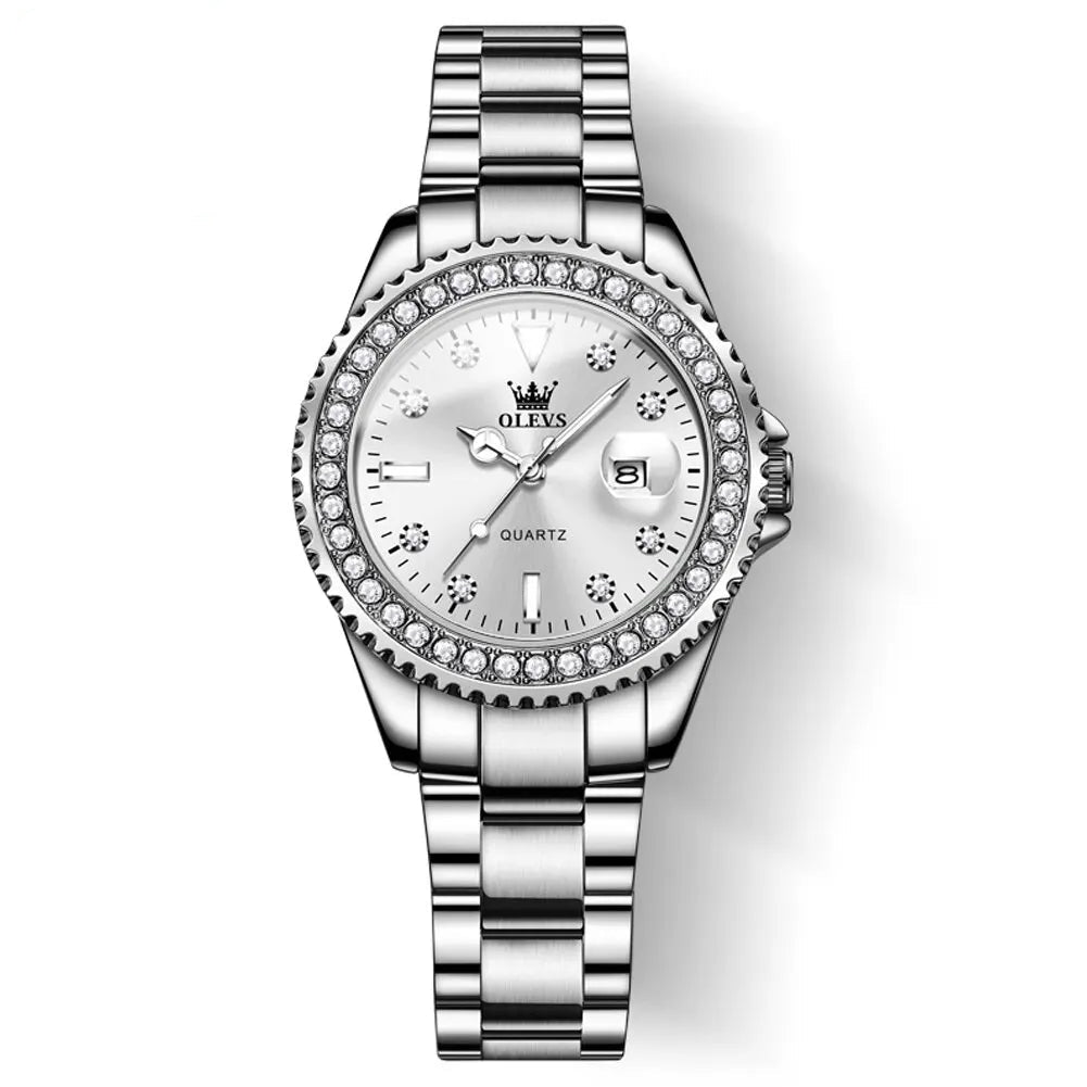 Chic women’s diamond dial quartz watch with white face, stainless steel bracelet, crystal bezel, date display, and elegant polished finish on a white background