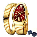 Glamorous snake shape women’s watch with gold expandable bracelet, red dial, diamond accents, Roman numerals, and glamorous luxury shine design on a white background