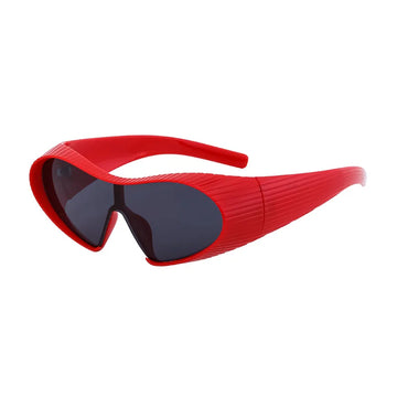 Red sunglasses with a ribbed texture on a white background
