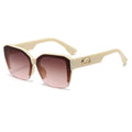 Beige sunglasses with gradient lenses on a white background