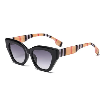 Sunglasses with black frame and gradient lenses on a white background