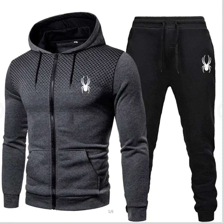 Gray hoodie and black pants with a spider logo on a white background