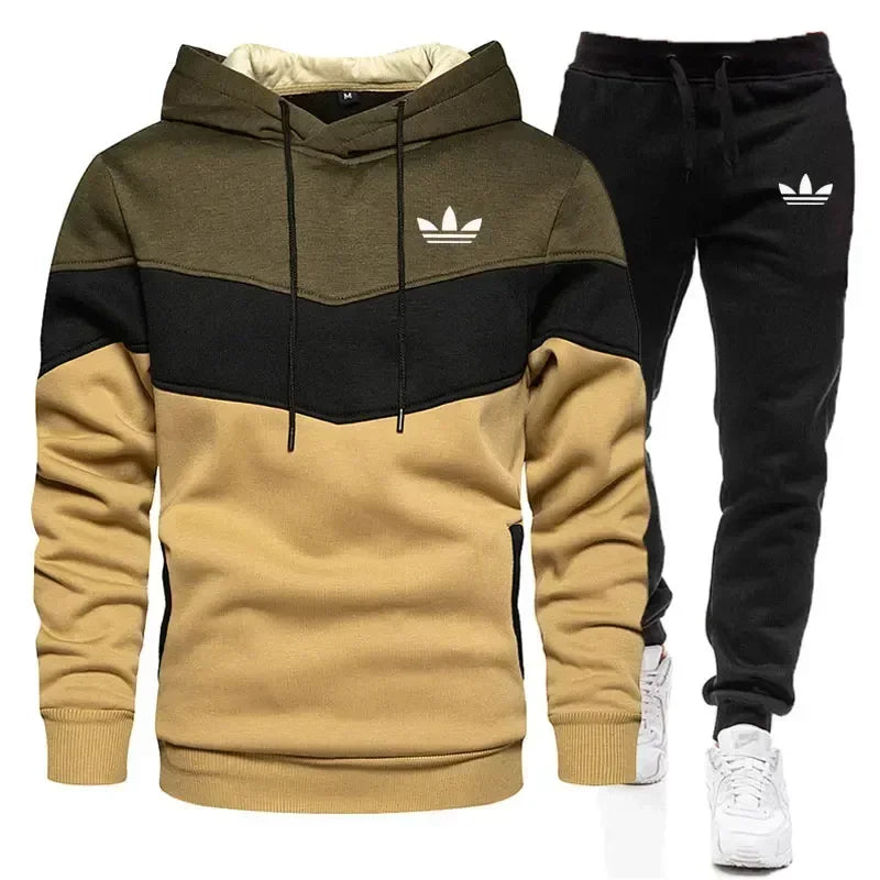 Adidas tracksuit with hoodie and pants on a white background