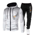 White hoodie with black accents and black pants with white logo on a white background