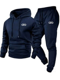 Navy tracksuit with 'aio' logo on a white background
