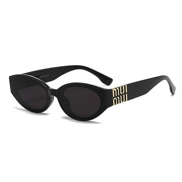 Black sunglasses with gold accents on a white background