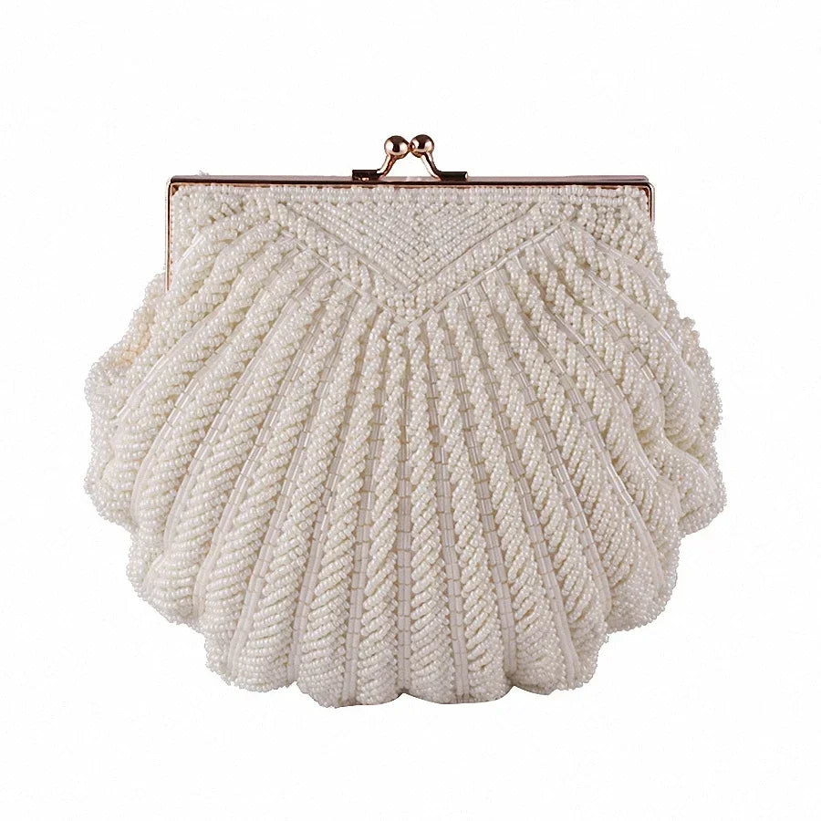 Women's Clutch Bag: Elegant evening clutch bags for weddings. Featuring a bridal handbag adorned with pearl beads.