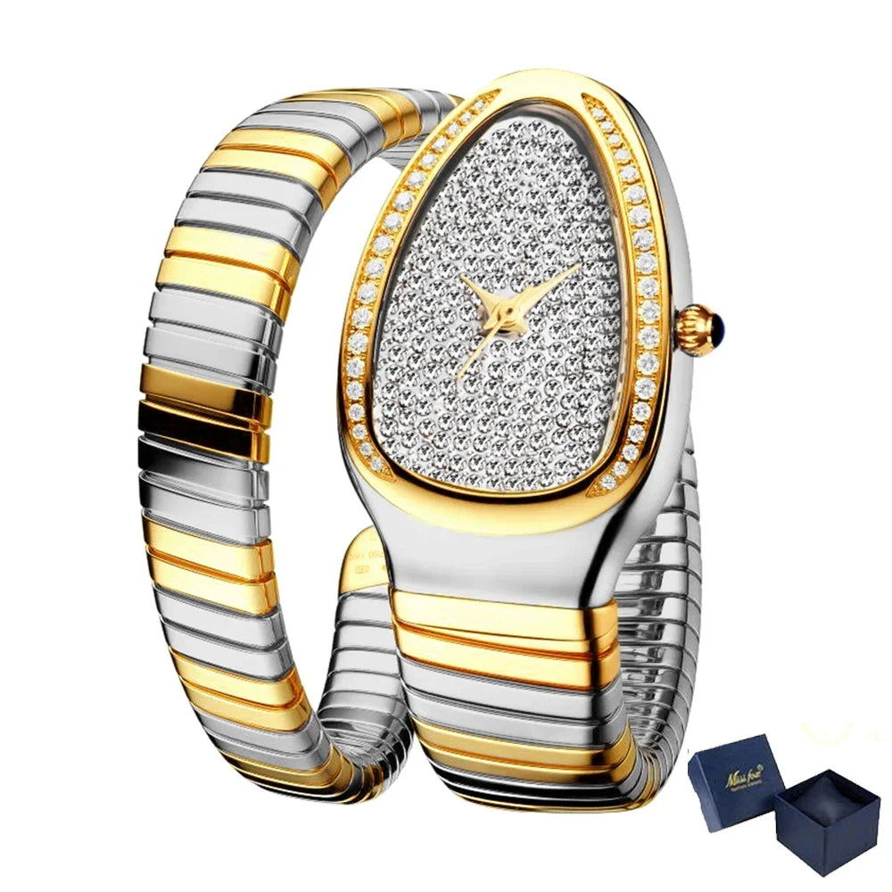 Sparkling snake watch for women with gold and silver expandable bracelet, crystal dial, diamond bezel, and elegant luxury design on a white background