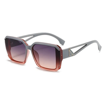 Sunglasses with gradient lenses on a white background