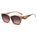Beige sunglasses with gradient lenses on a white background