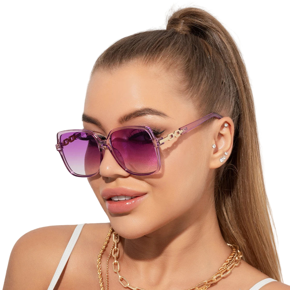 Woman wearing purple sunglasses with a white background