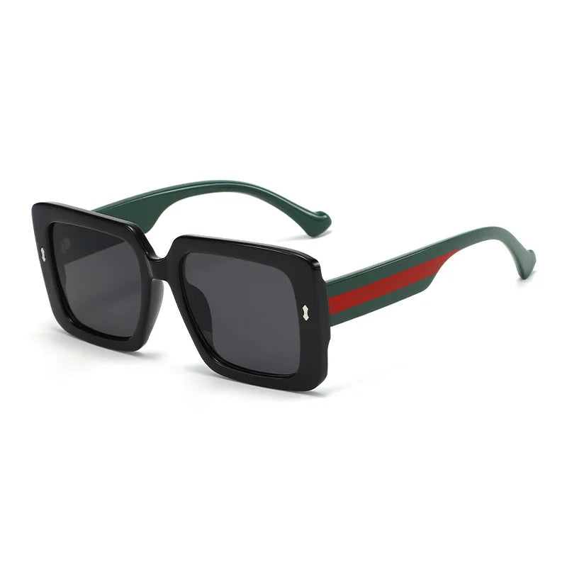 Sunglasses with green and red striped arms on a white background