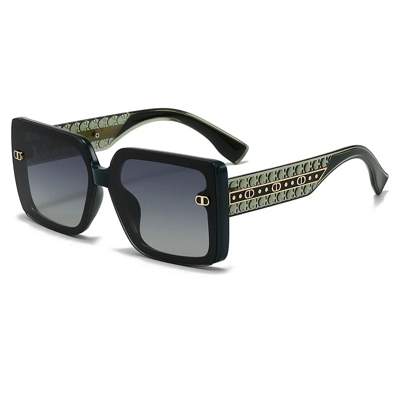 Sunglasses with decorative patterned arms on a white background