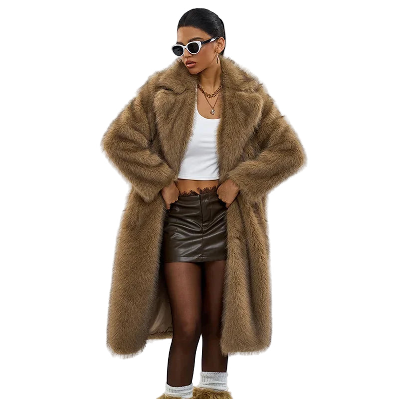 Person wearing a long brown fur coat on a white background