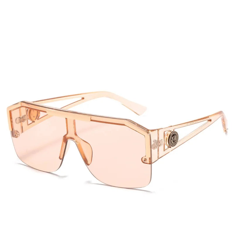 Sunglasses with tortoiseshell frame and gradient lenses on a white background