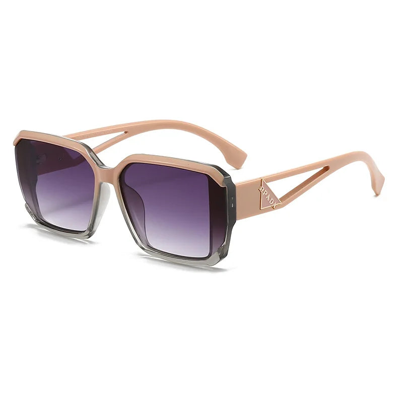 Sunglasses with rose gold frame and purple gradient lenses on a white background