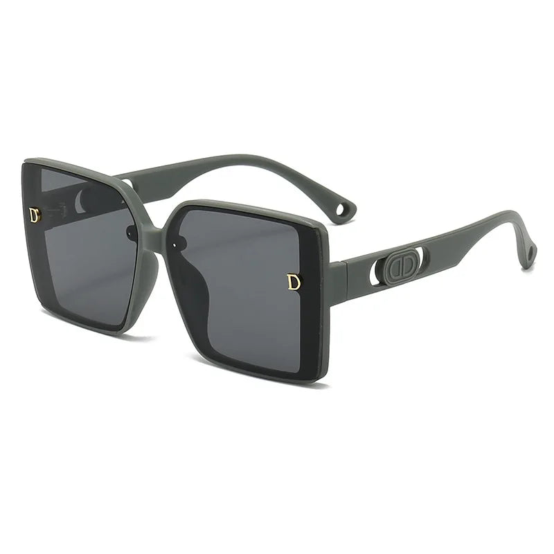 Black sunglasses with a brand logo on a white background