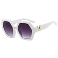 White sunglasses with gold accents on a white background