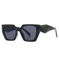 Black sunglasses with a geometric frame on a white background