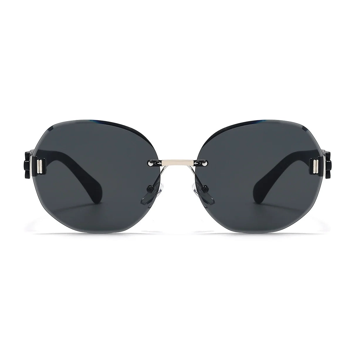 Sunglasses with dark lenses and metallic frame on a white background