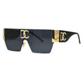 Sunglasses with gold accents and black lenses on a white background