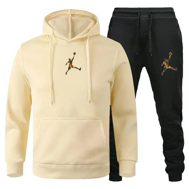 Beige hoodie and black pants with a logo on a white background