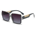 Sunglasses with gold accents on a white background