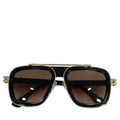 Black and gold sunglasses with brown lenses on a white background