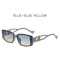 Sunglasses with blue frame and gradient lenses on a white background