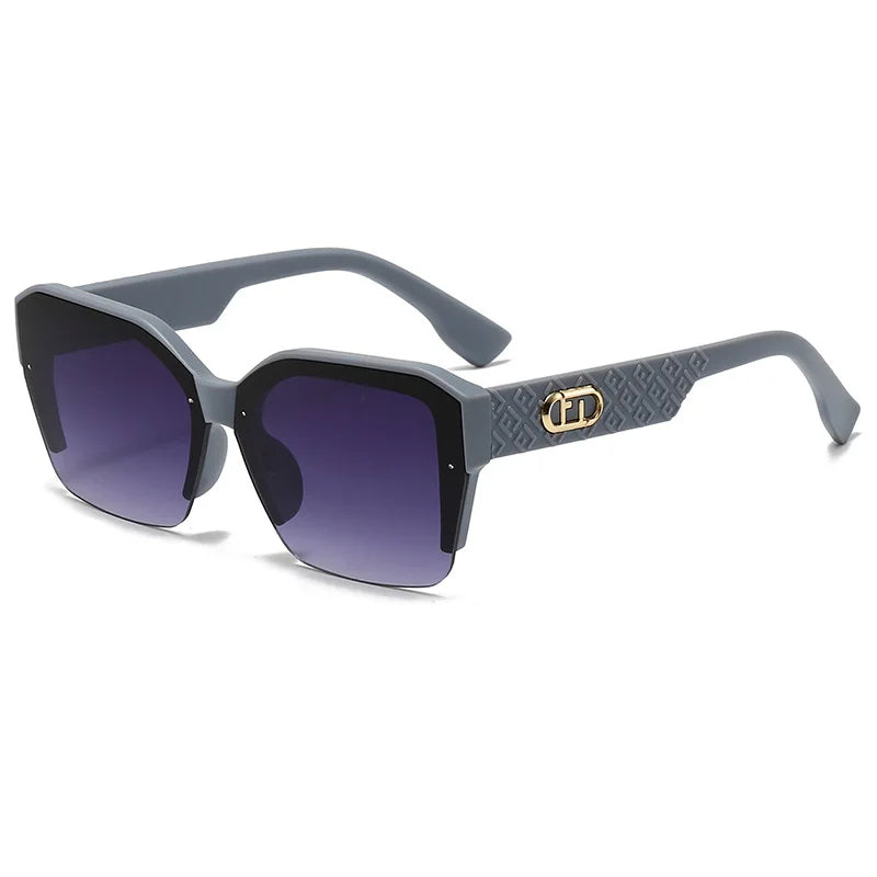Sunglasses with dark lenses and a gray frame on a white background