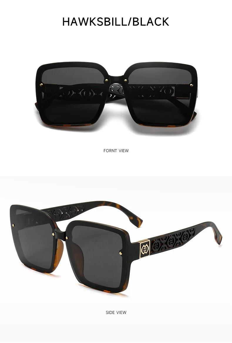 Sunglasses with decorative frame and dark lenses on a white background