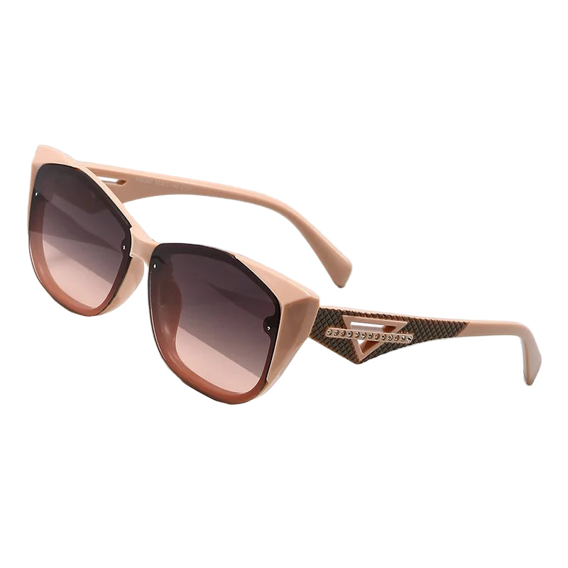 Sunglasses with beige frame and brown gradient lenses on a white background