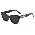 Black sunglasses with a gold logo on a white background