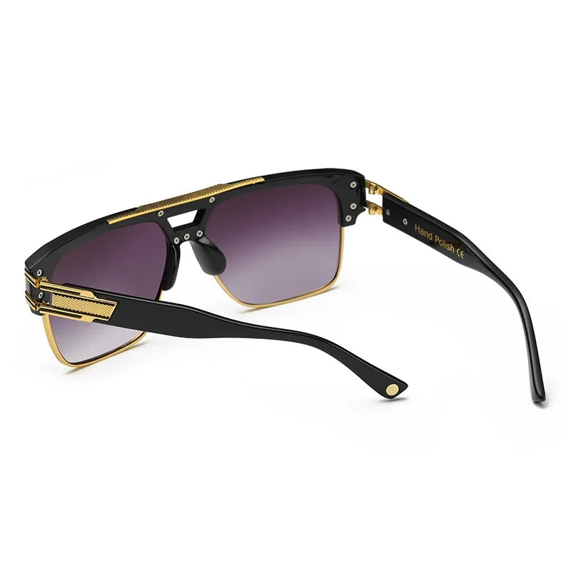 Sunglasses with black and gold frame on a white background