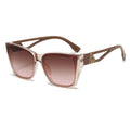 Sunglasses with a brown gradient lens and clear frame on a white background