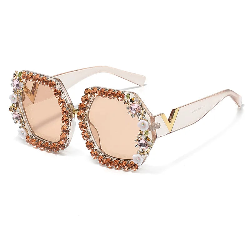 Sunglasses with decorative embellishments on a white background