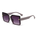 Sunglasses with purple gradient lenses and gray frame on a white background