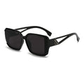 Black sunglasses with a brand logo on a white background