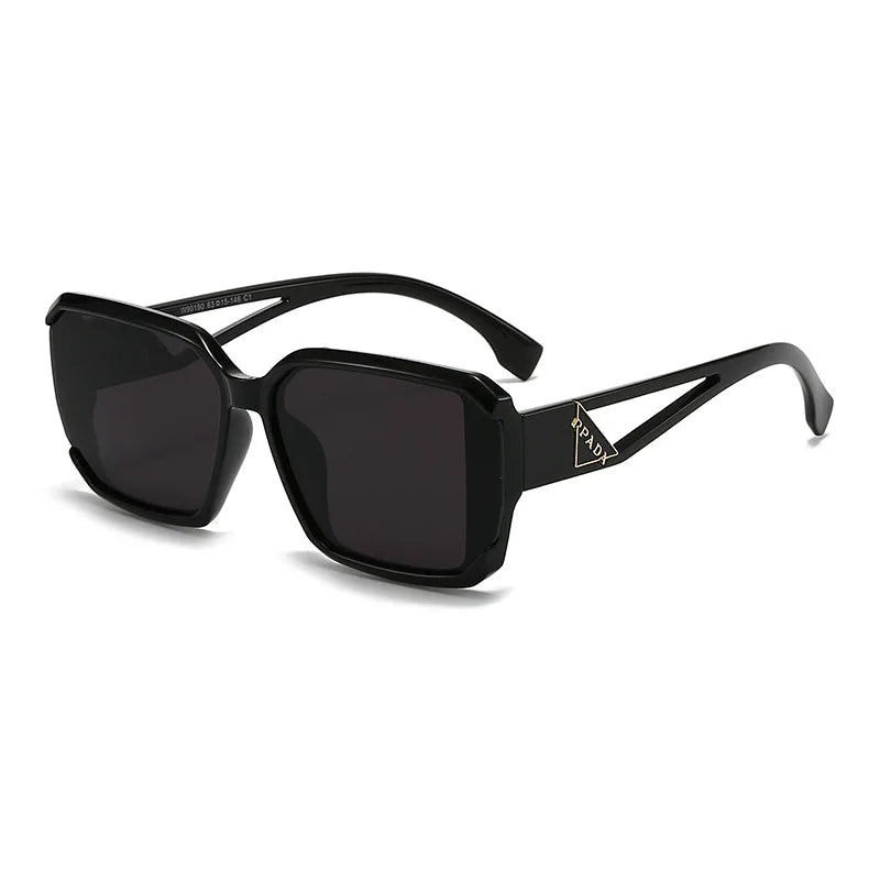 Black sunglasses with a brand logo on a white background