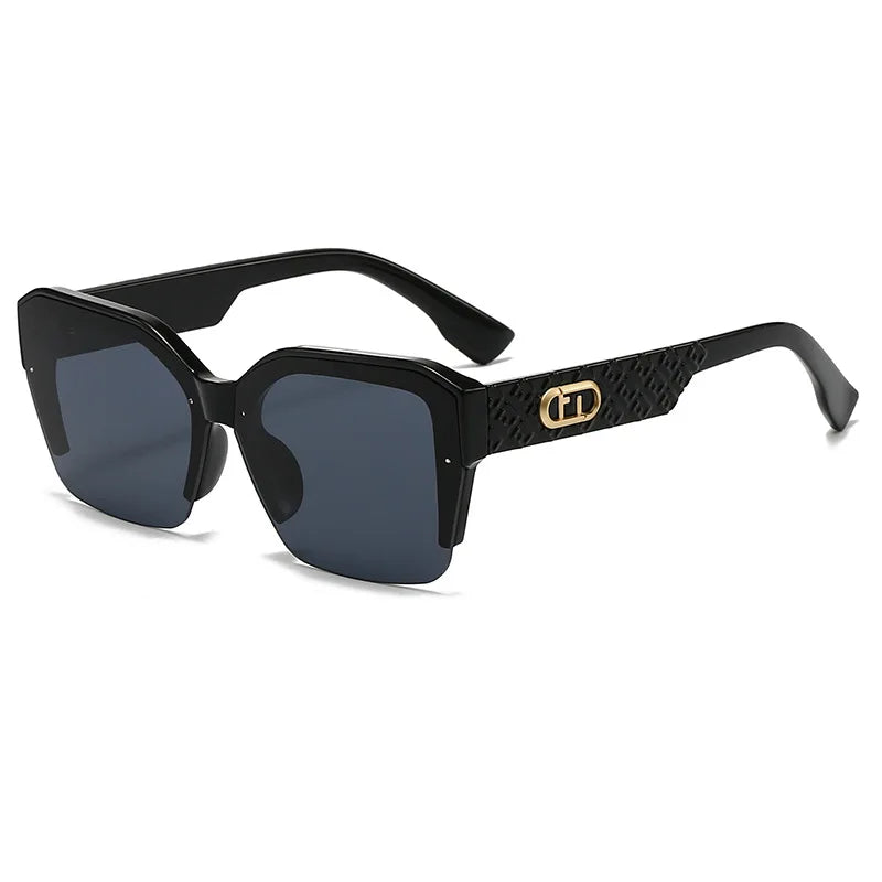 Black sunglasses with a gold logo on a white background