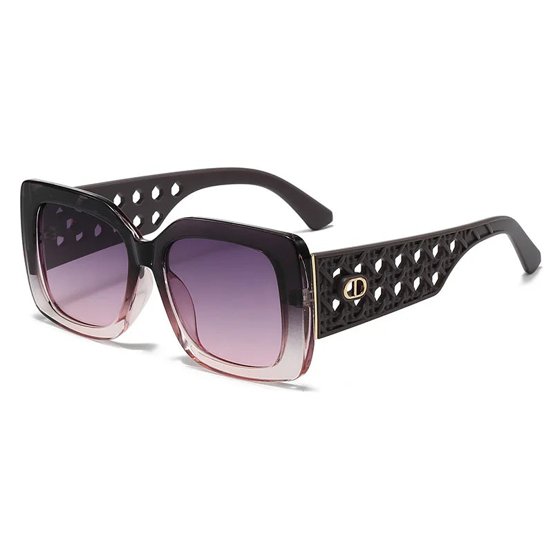 Sunglasses with black perforated frame and purple gradient lenses on a white background