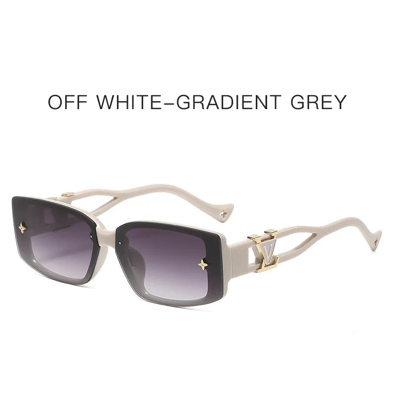 Sunglasses with off-white frame and gradient grey lenses on a white background