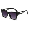 Black sunglasses with a distinctive logo on a white background