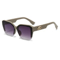 Sunglasses with purple gradient lenses and beige frame on a white background