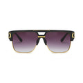 Sunglasses with black and gold frame on a white background