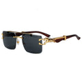 Sunglasses with gold frame and black lenses on a white background