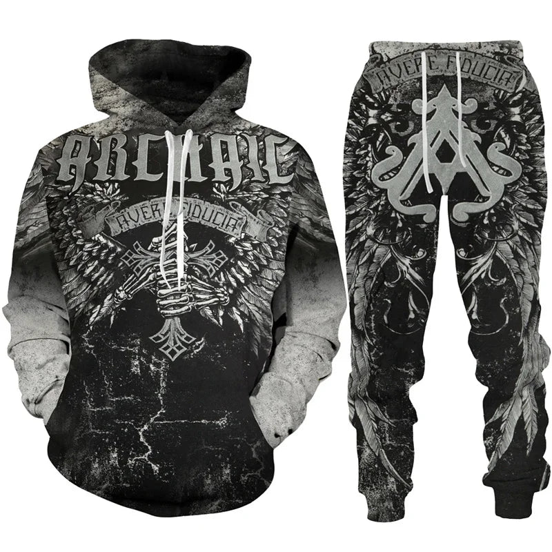 Hoodie and pants set with intricate designs and text on a white background