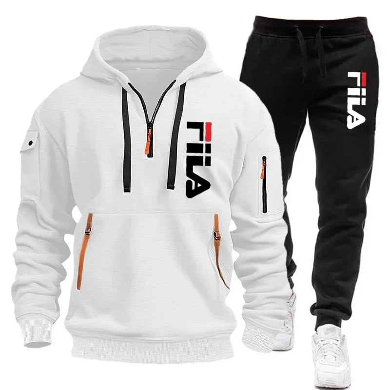 White hoodie and black pants with Fila logo on a white background