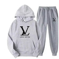Gray hoodie and pants set with Louis Vuitton logo on a white background